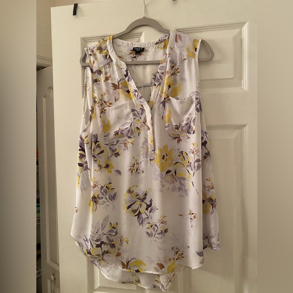 Torrid sleeveless blouse.